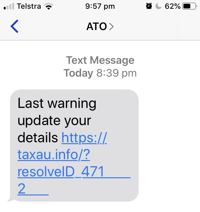 An example of a scam text message asking you to log into a service.