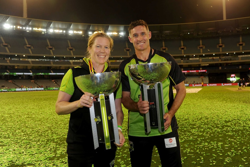 Sydney Thunder captains Blackwell, Hussey with WBBL, BBL trophies