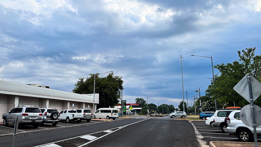 A street in Katherine covered by dark clouds.