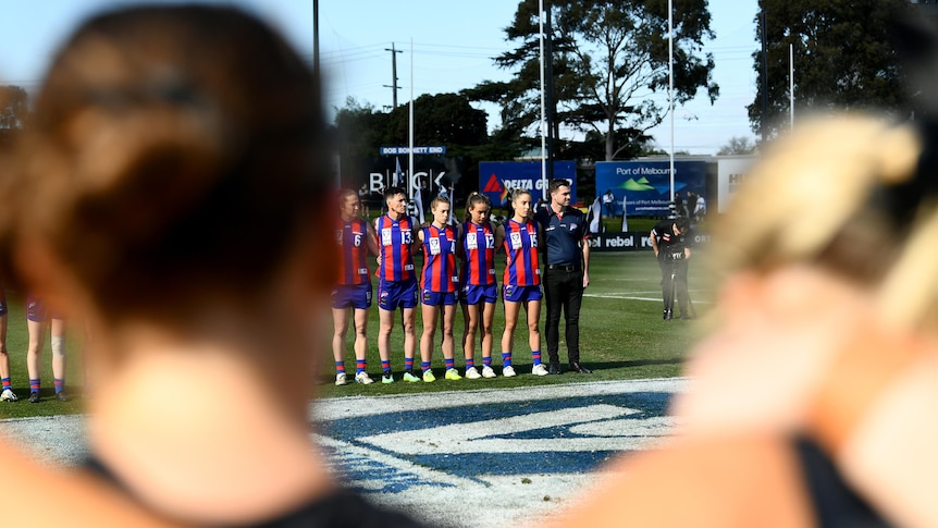 Port Melbourne stands for the national anthem during the 2023 VFLW Grand Final.