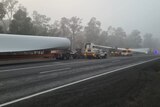 Large white blades and trailers, there's a truck on highway
