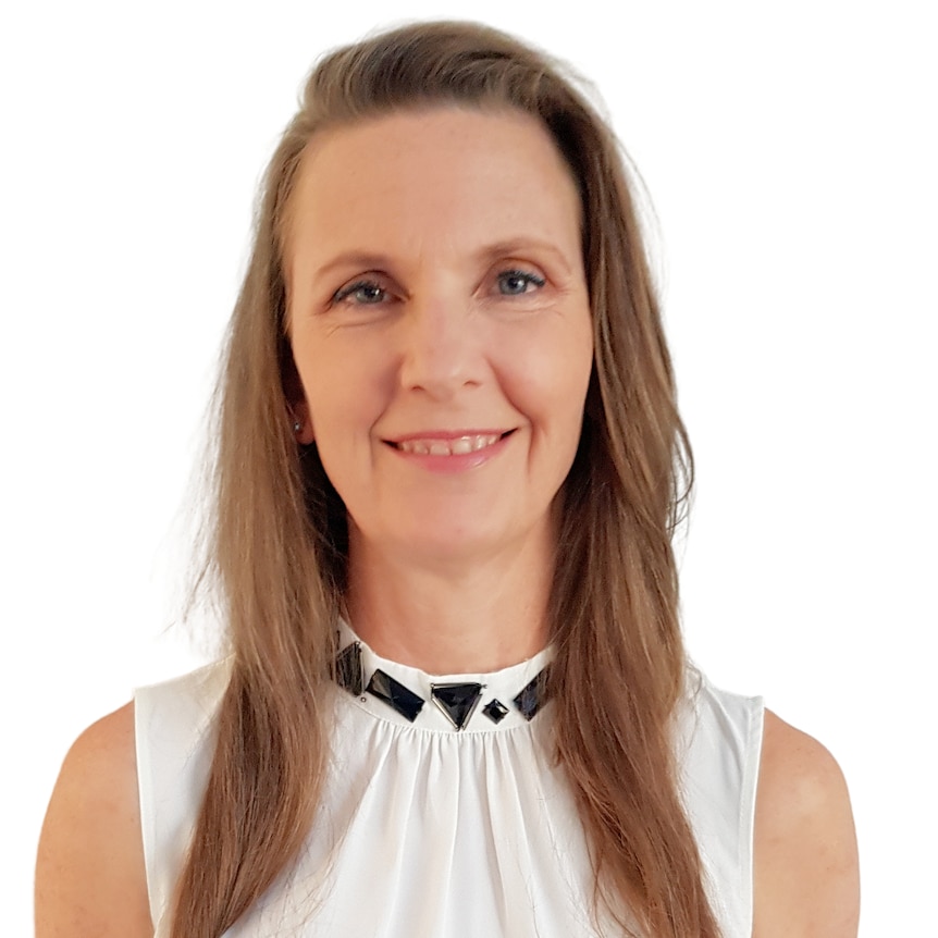 woman in sleeveless white blouse, smiling