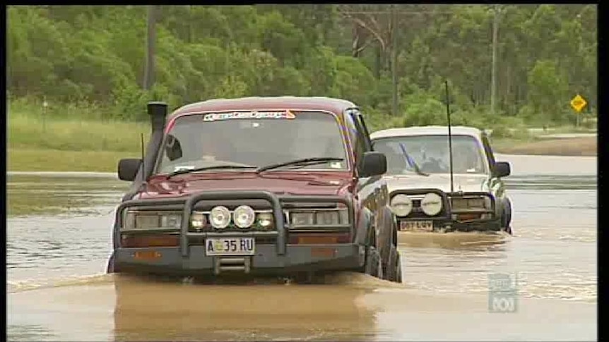 In central Queensland, some roads are blocked and some residents are receiving food drops.