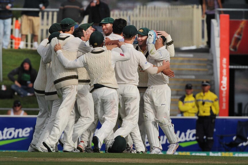 Game wrapped up ... Australia celebrates after Mitchell Starc took the final wicket.