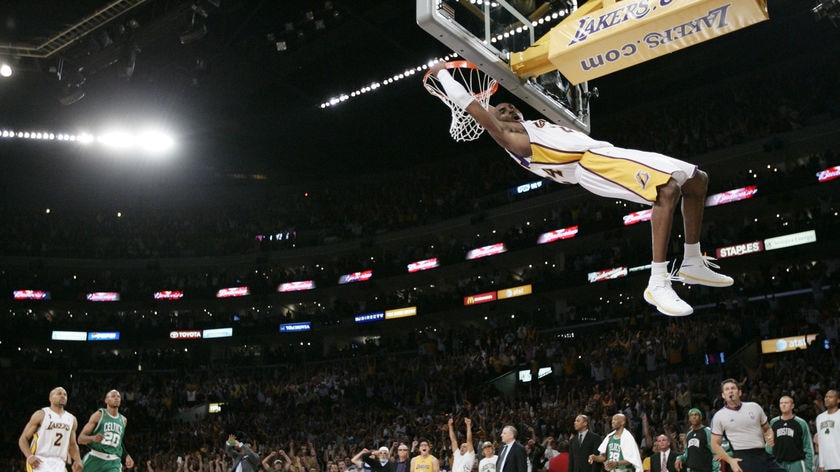 Kobe Bryant dunks against Boston