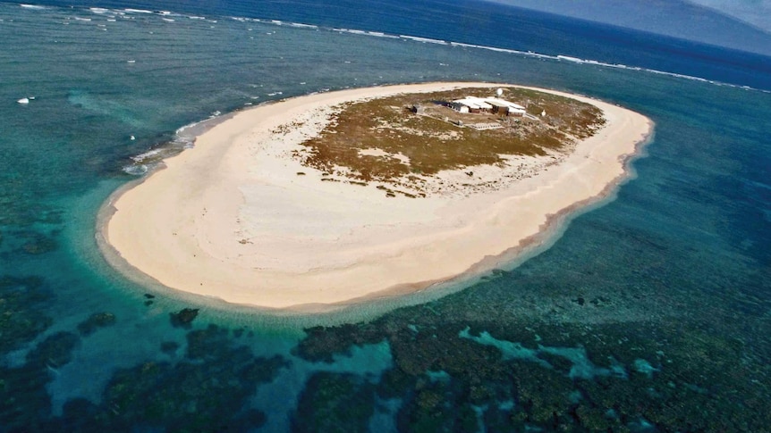 Aerial photo of weather station on Willis Island, 450 kms east of Cairns in far north Queensland in the Coral Sea