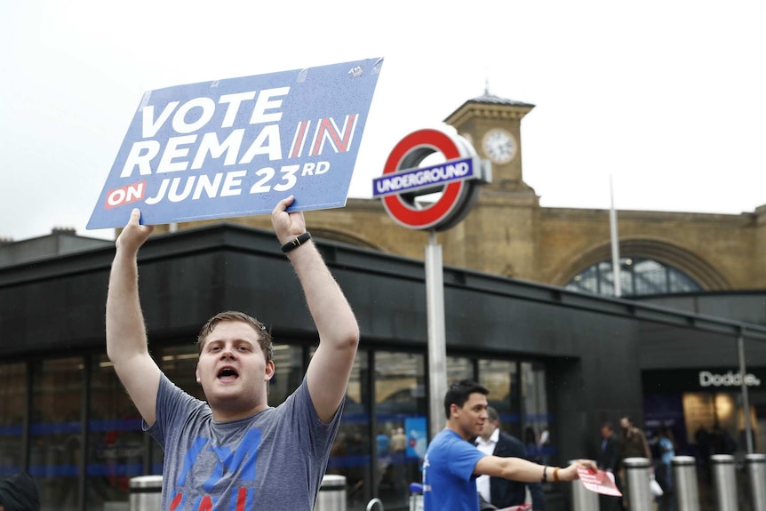 A "Vote Remain" activist urges people to vote outside Kings Cross station