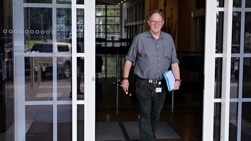 Dr Robert Parker exiting the Northern Territory Supreme Court building.