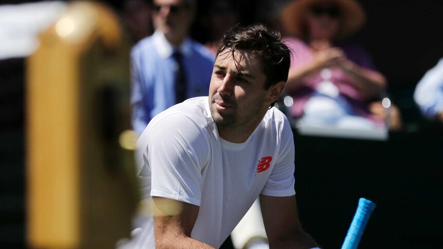 Jordan Thompson of Australia after being defeated by Sam Querrey at Wimbledon in round one, 2018.