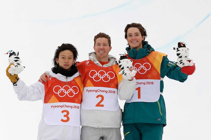 Ayumu Hirano, Shaun White and Scotty James stand on the podium to pose for photographers in Pyeongchang.