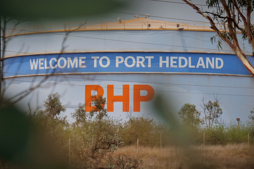 A water tank with the words 'Welcome to Port Hedland' and the BHP logo