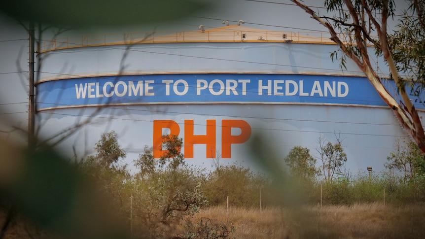 A water tank with the words 'Welcome to Port Hedland' and the BHP logo