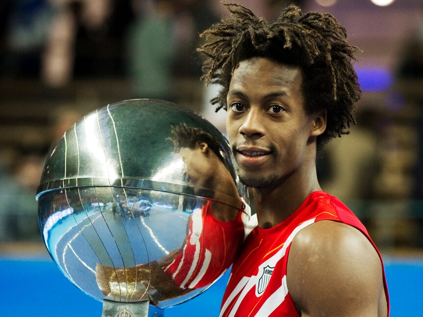 Gael Monfils edged Jarkko Nieminien over three sets to secure the Stockholm Open - his first title in a year.