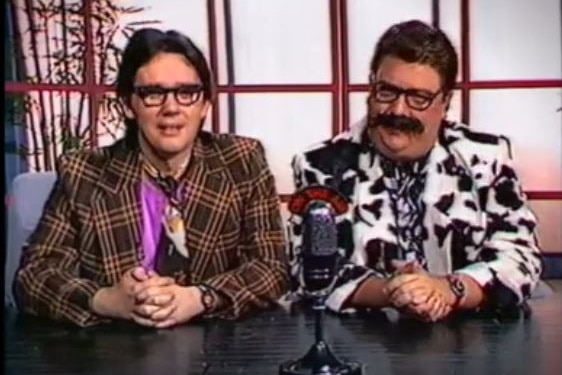 two men wearing glasses