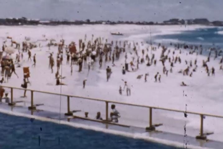 The beach at Burleigh in the 1950s showing waves and bathers