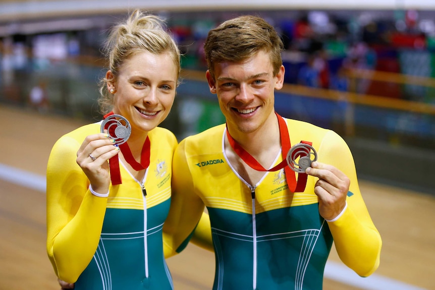 Alex and Annette Edmondson show off their silver medals