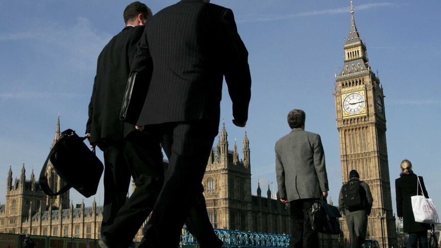 Commuters walk to work over Westminster Bridge in central London, 2006.