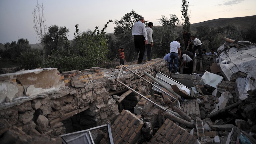 Iranians search rubble for quake survivors