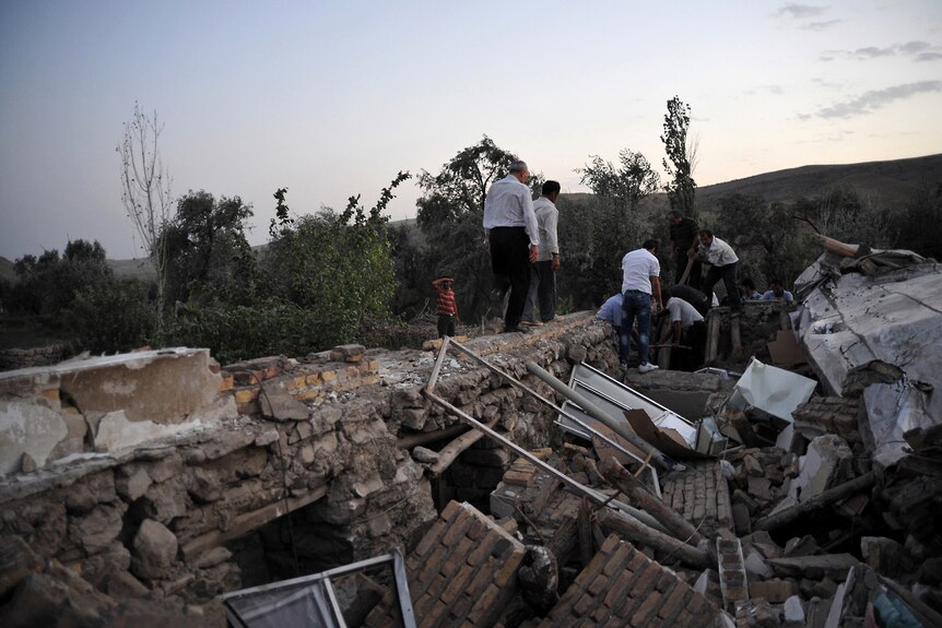 Iranians search rubble for quake survivors