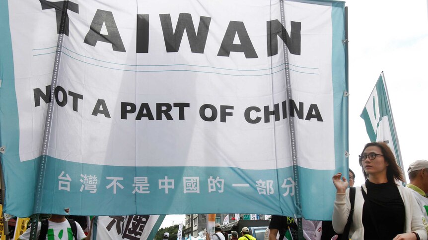 Banner at demonstration reading 'Taiwan not a part of China'
