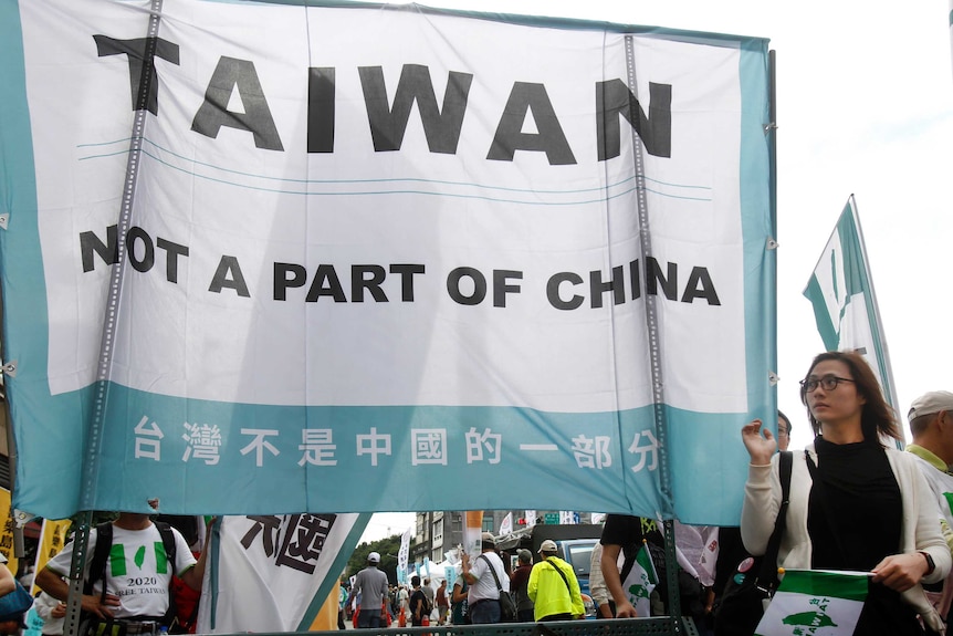 Banner at demonstration reading 'Taiwan not a part of China'