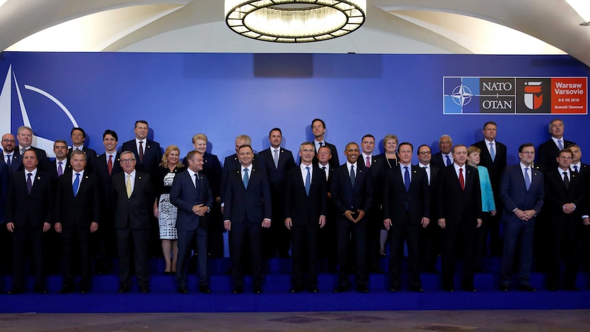 NATO leaders standing together