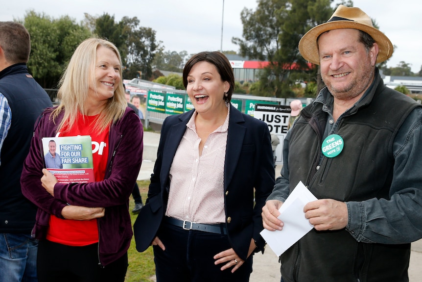 Jodi McKay next to Labor and Greens polling booth workers.