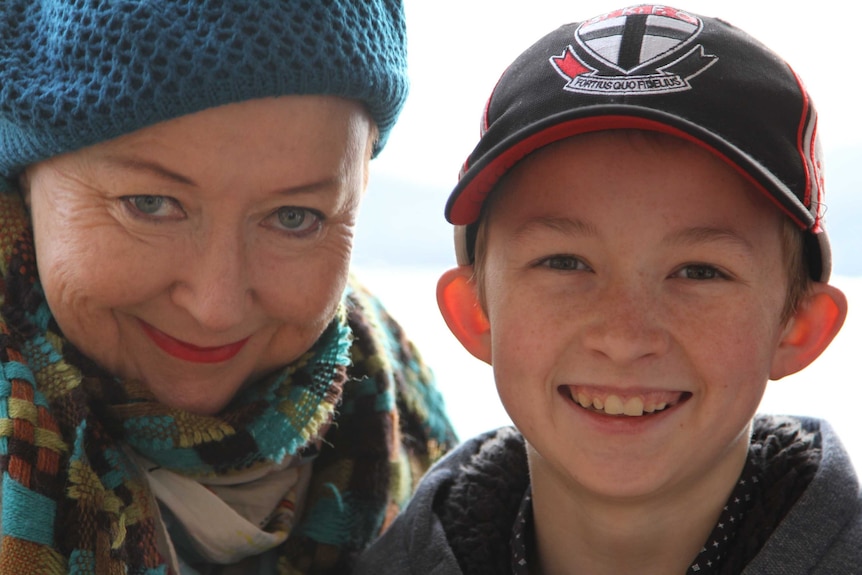 Close up photo of Karen Borger and Campbell Remess smiling.