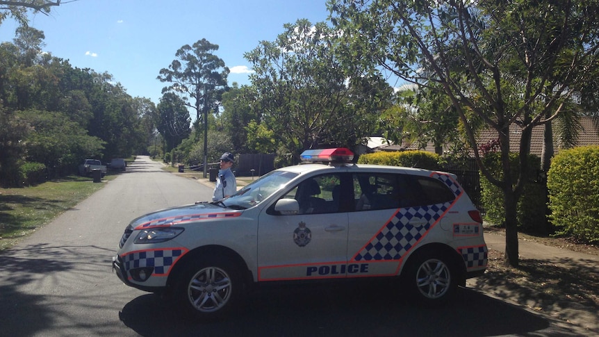 Police have set up a roadblock and a crime scene on Dakar Road in Algester.