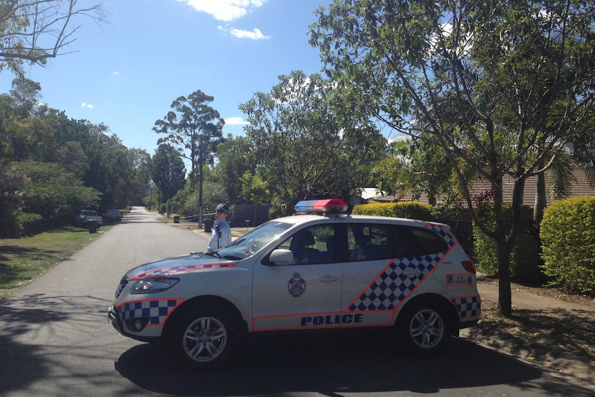 Police have set up a roadblock and a crime scene on Dakar Road in Algester.