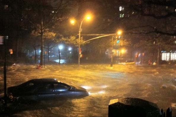 Floodwaters rush through Lower Manhattan, New York City
