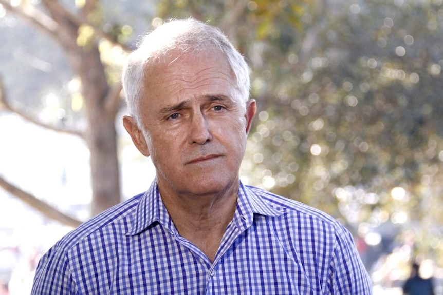 Malcolm Turnbull looks serious in Watson's Bay in Sydney