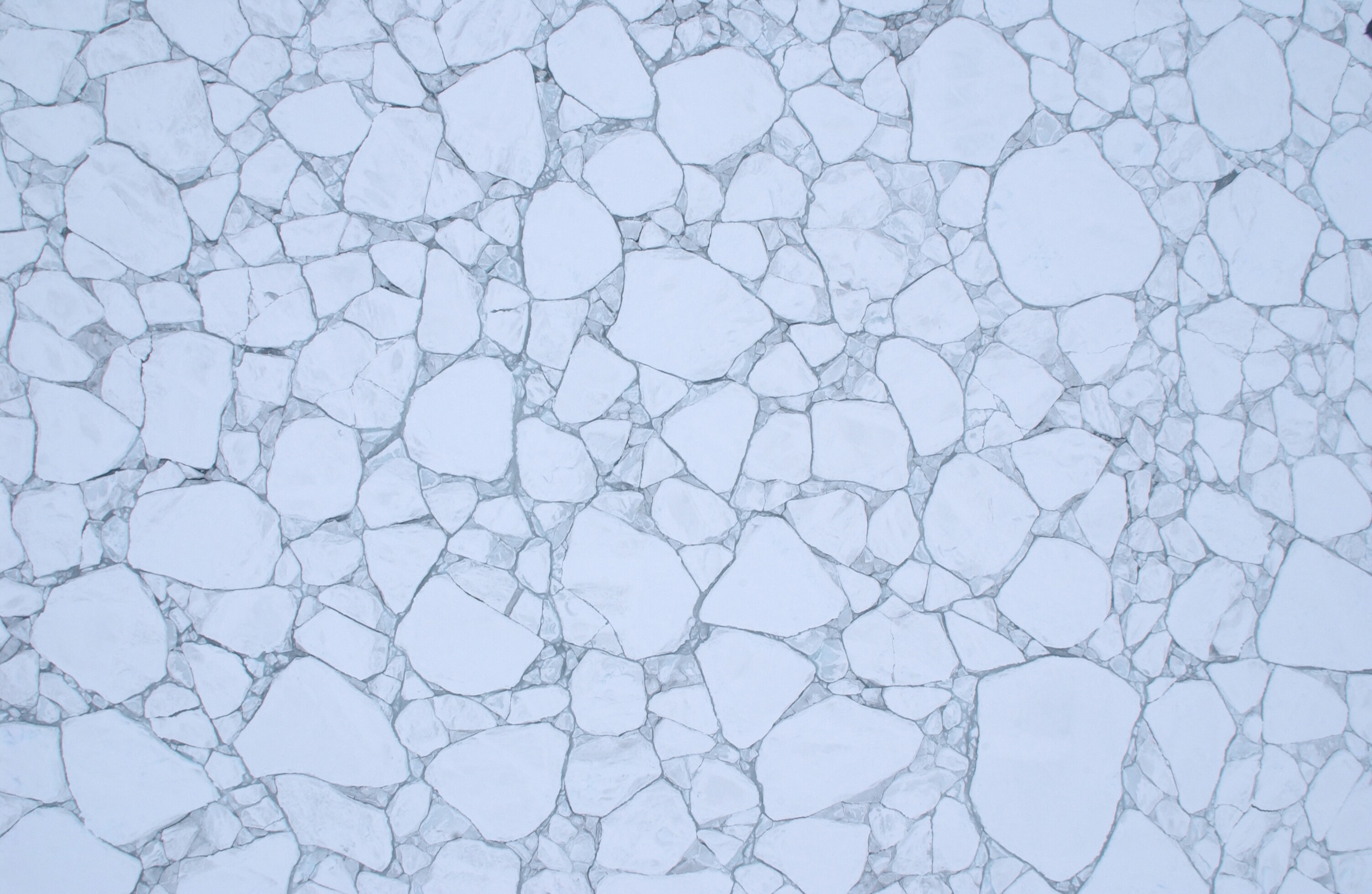 An aerial view of broken ice.