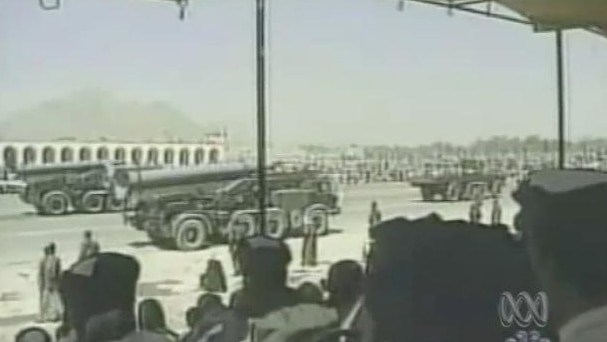 A parade of missile launchers, possibly in Iraq