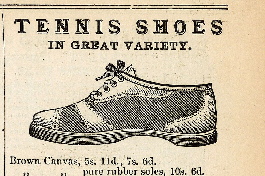 A black and white advertisement with a drawing of a flat soled tennis shoe.