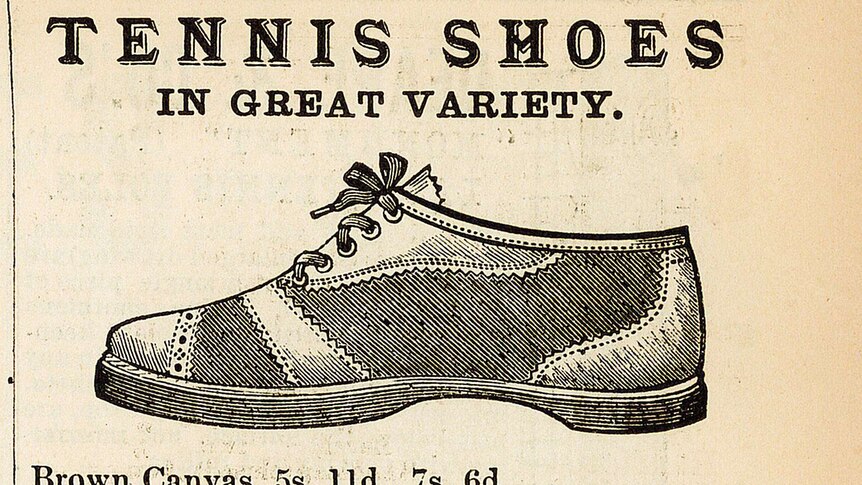 A black and white advertisement with a drawing of a flat soled tennis shoe.