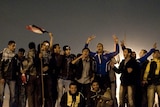 Egyptian demonstrators celebrate