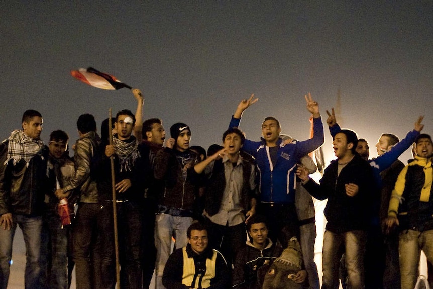 Egyptian demonstrators celebrate