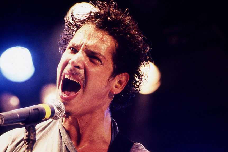 Chris Cornell performs on stage at the 1997 Big Day Out