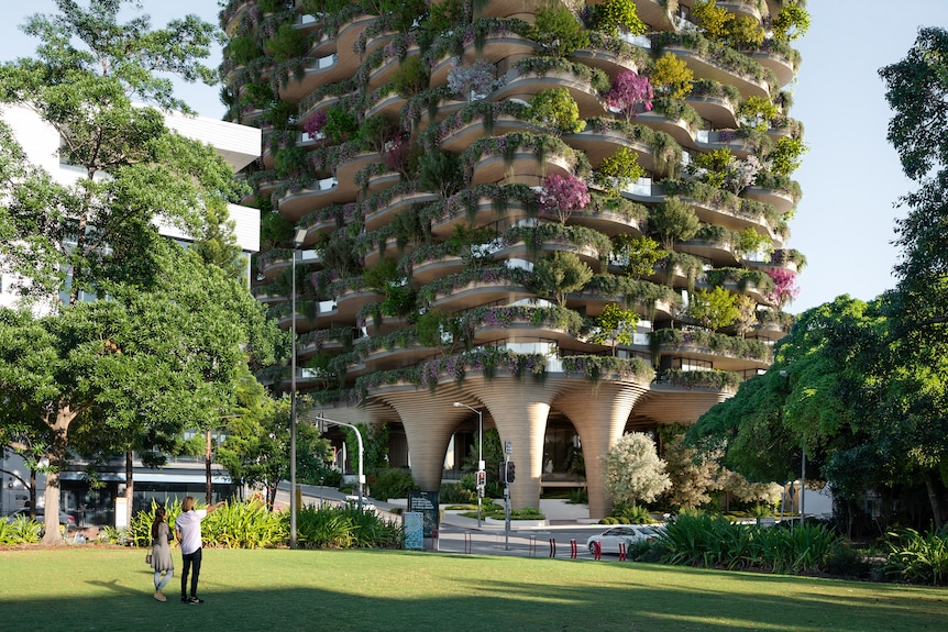 A computer-generated image of an apartment tower covered in plants.