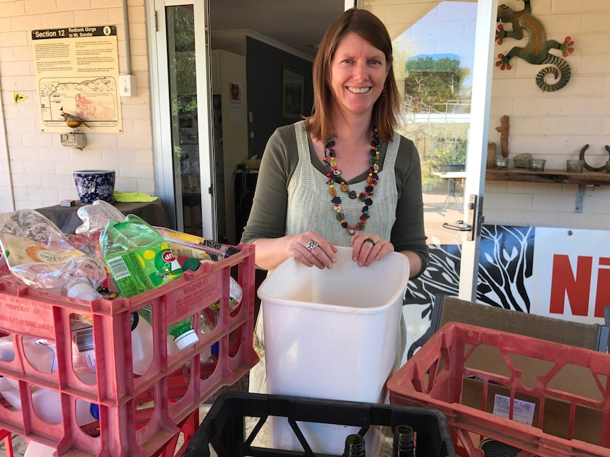 Alice Springs resident Kate Crossing separates her recycling