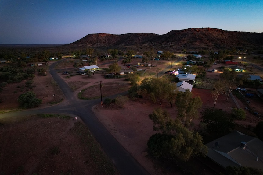 aerial shot of remote community in evening
