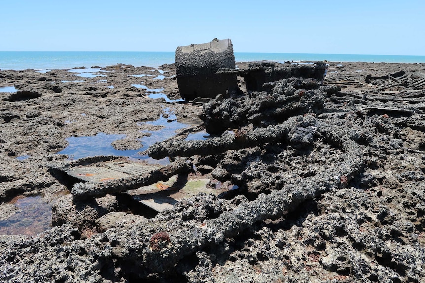 A close up of the SS Brisbane shipwreck with the ocean in the background