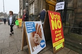 Voters leave a polling station during the initial referendum on Scottish independence in 2014.