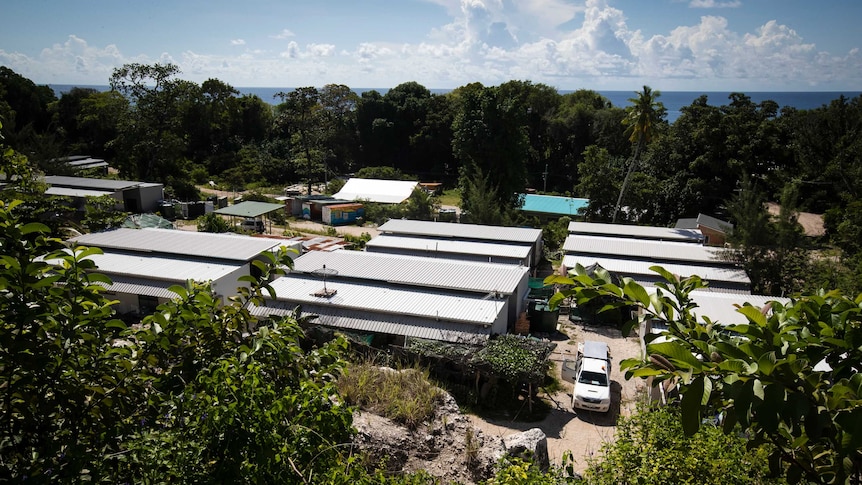 Nibok refugee settlement on Nauru. It is a row of rectangular accommodation units.