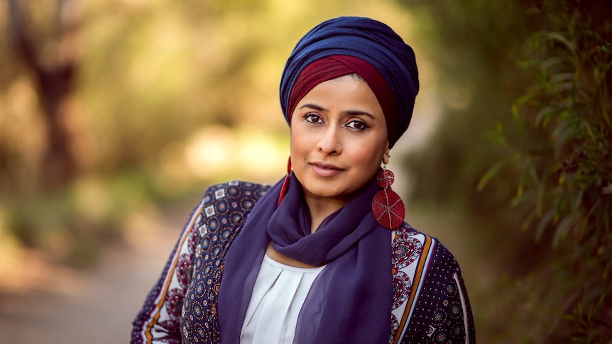 Cultural consultant Tasneem Chopra wearing matching turban and scarf.