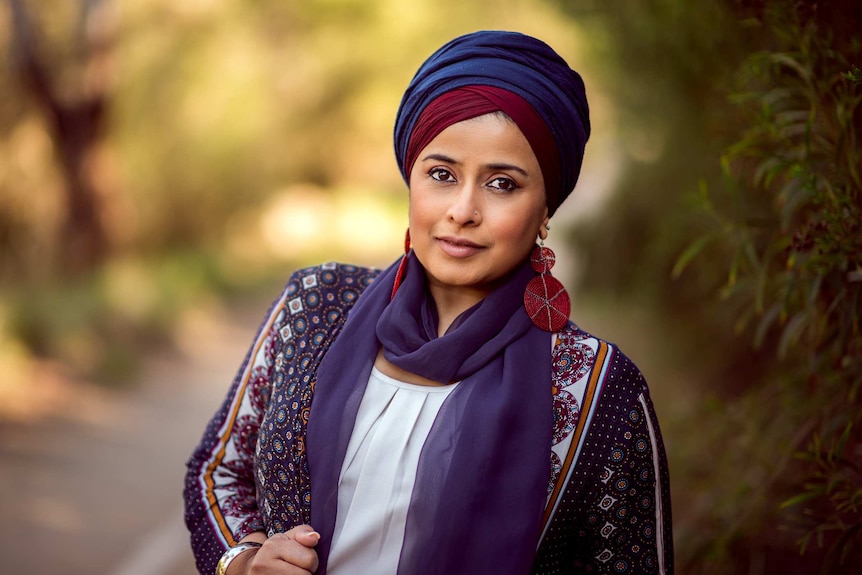 Cultural consultant Tasneem Chopra wearing matching turban and scarf.