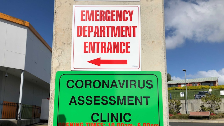 Coronavirus signs on a hospital wall.