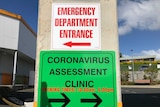 Coronavirus signs on a hospital wall.
