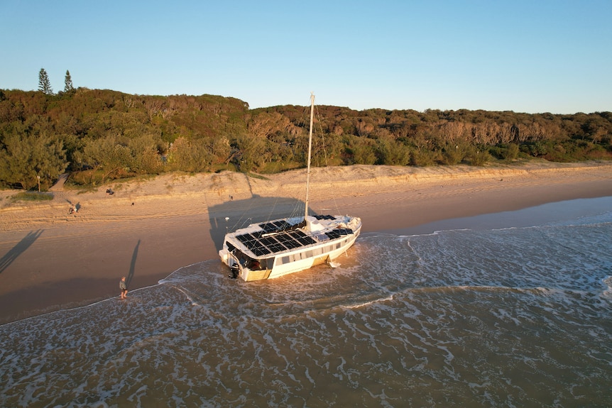 Yacht washed ashore on the beach